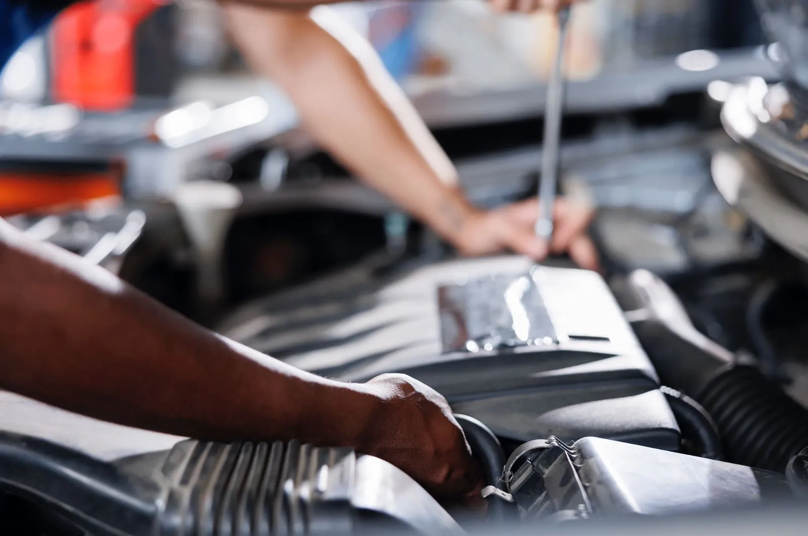 Technician carrying out a thorough vehicle inspection